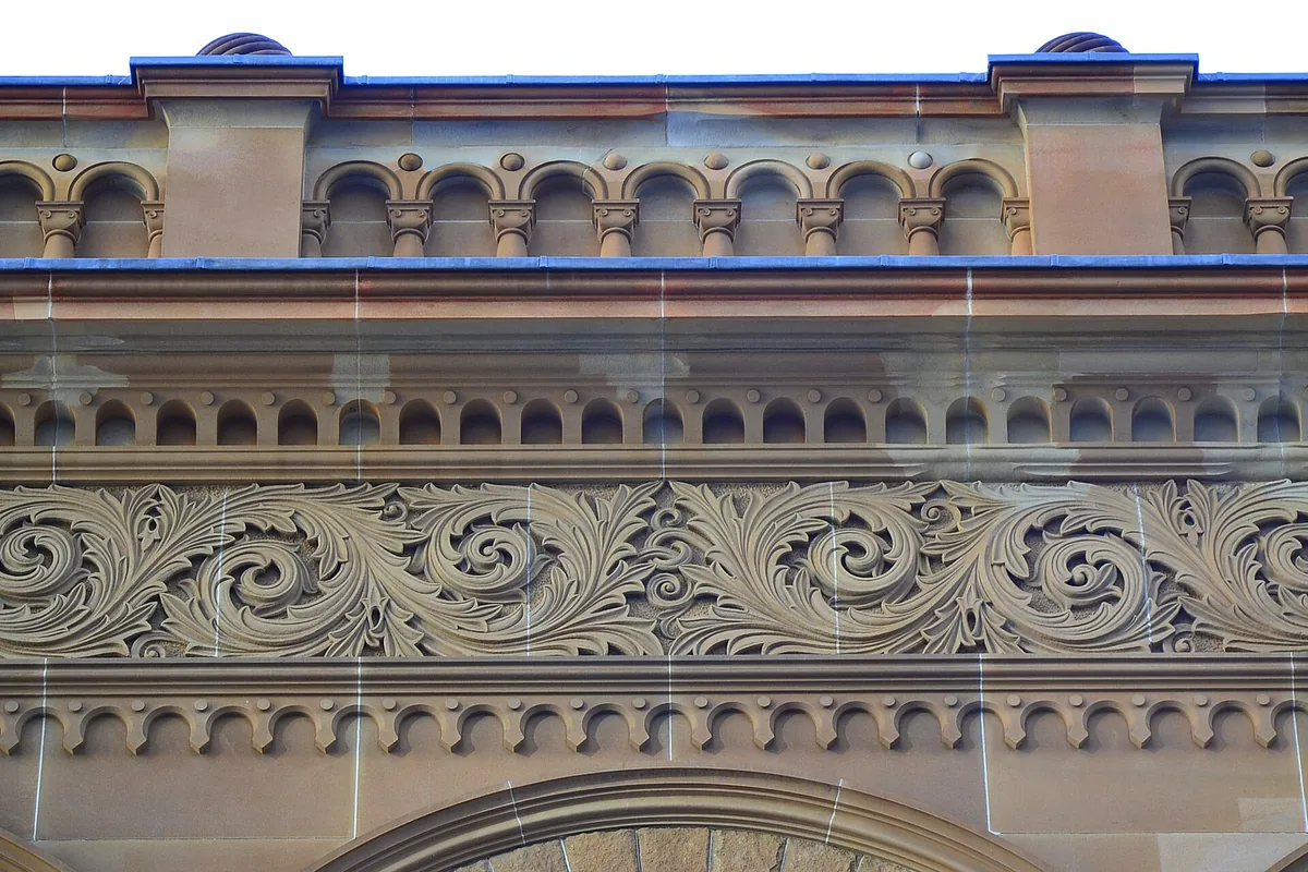 Ornate sandstone exterior and copper dome of Sydney Queen Victoria Building